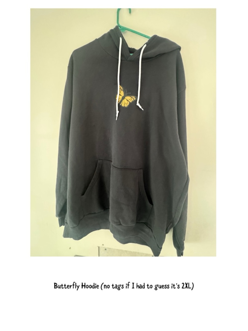Black Hoodie with Yellow Butterfly Graphic
